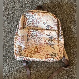 A new day leopard print backpack